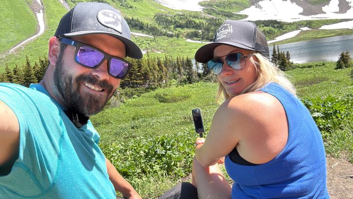 Ryan and Stacie arriving at Windfall Lake, with the meadow and snowfields behind