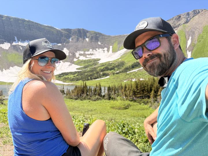 Stacie and Ryan at Windfall Lake with the headwall behind