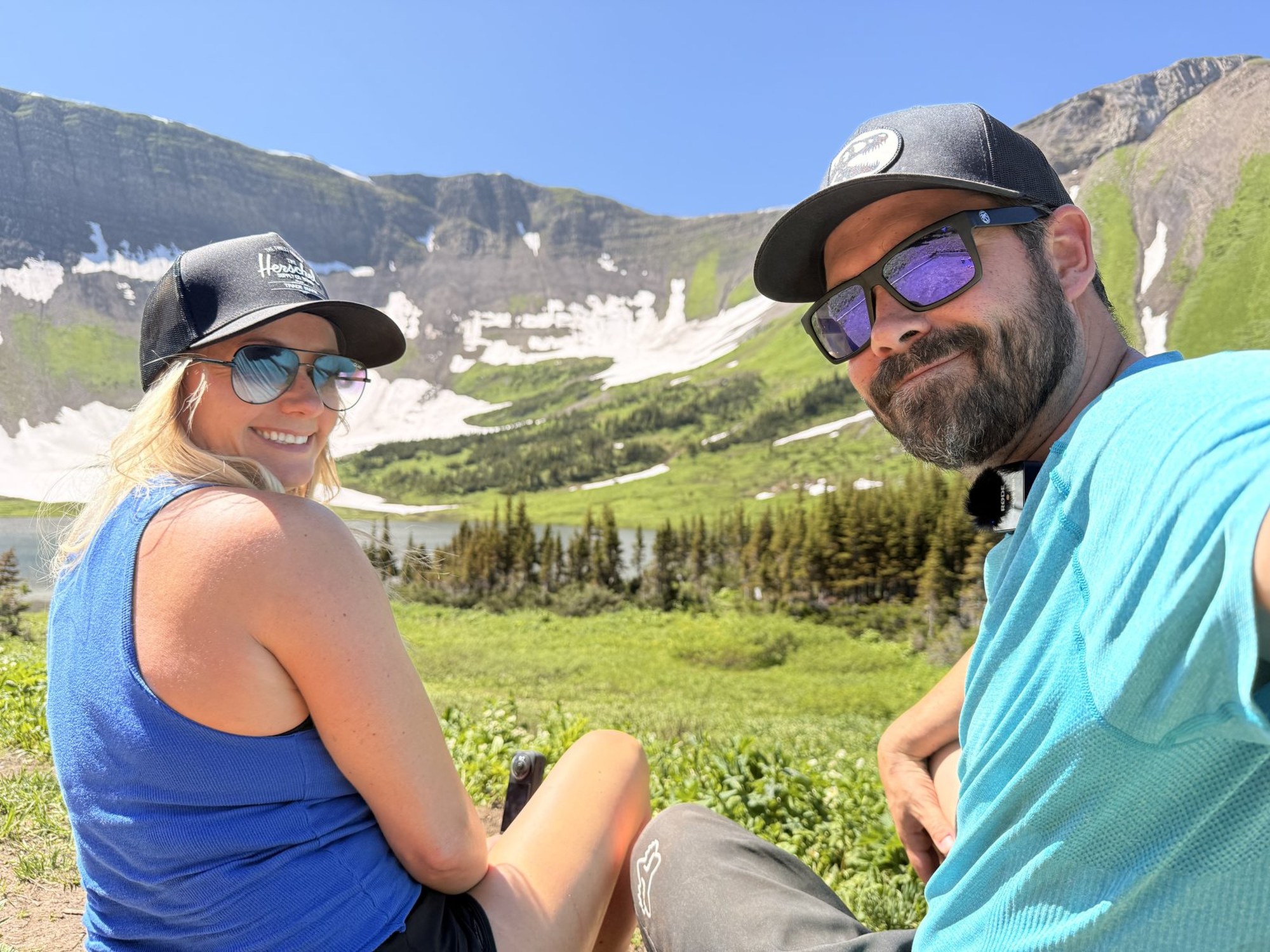 Stacie and Ryan sitting above the lake at Windfall Lake, Tumbler Ridge