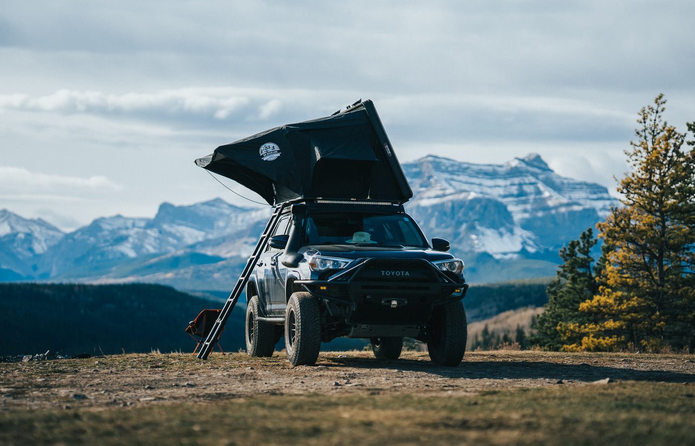 Equinox Lite rooftop tent open below the Rockies