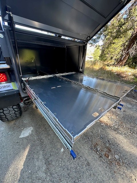 Dual rear access drawers pulled out of a Rove Recon trailer body